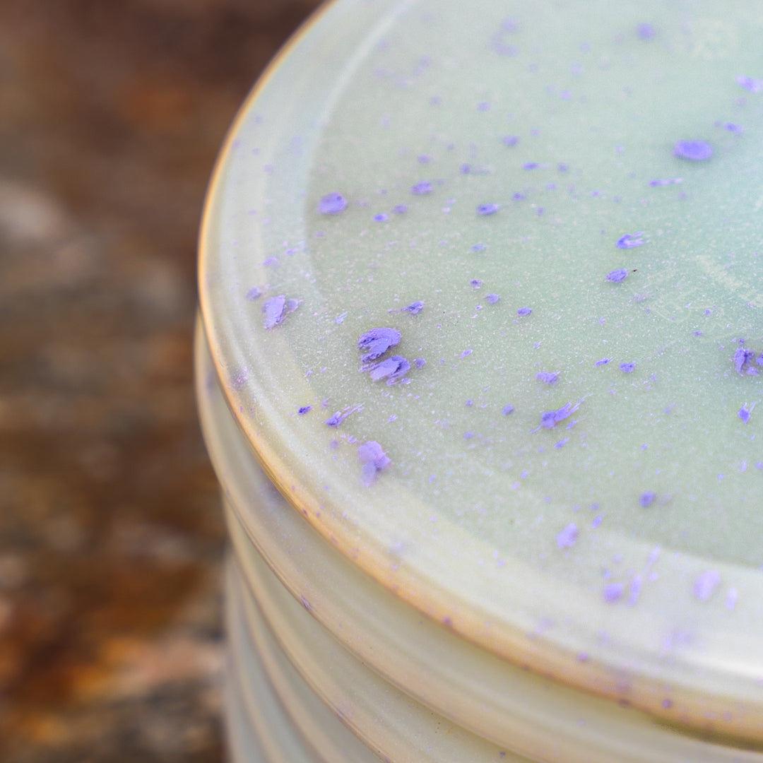 Closeup shot of the purple Trash Panda Crocs Inner Core disc golf throwing putter made from recycled plastic