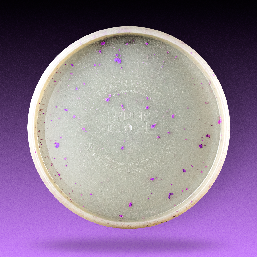 Studio shot of the purple Trash Panda Crocs Inner Core disc golf throwing putter made from recycled plastic