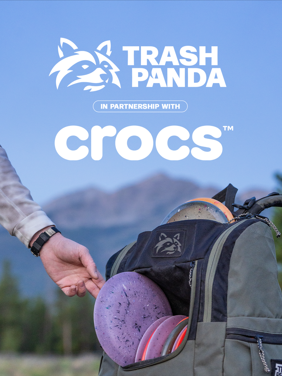purple trash panda disc golf disc made with crocs being pulled out of a bag