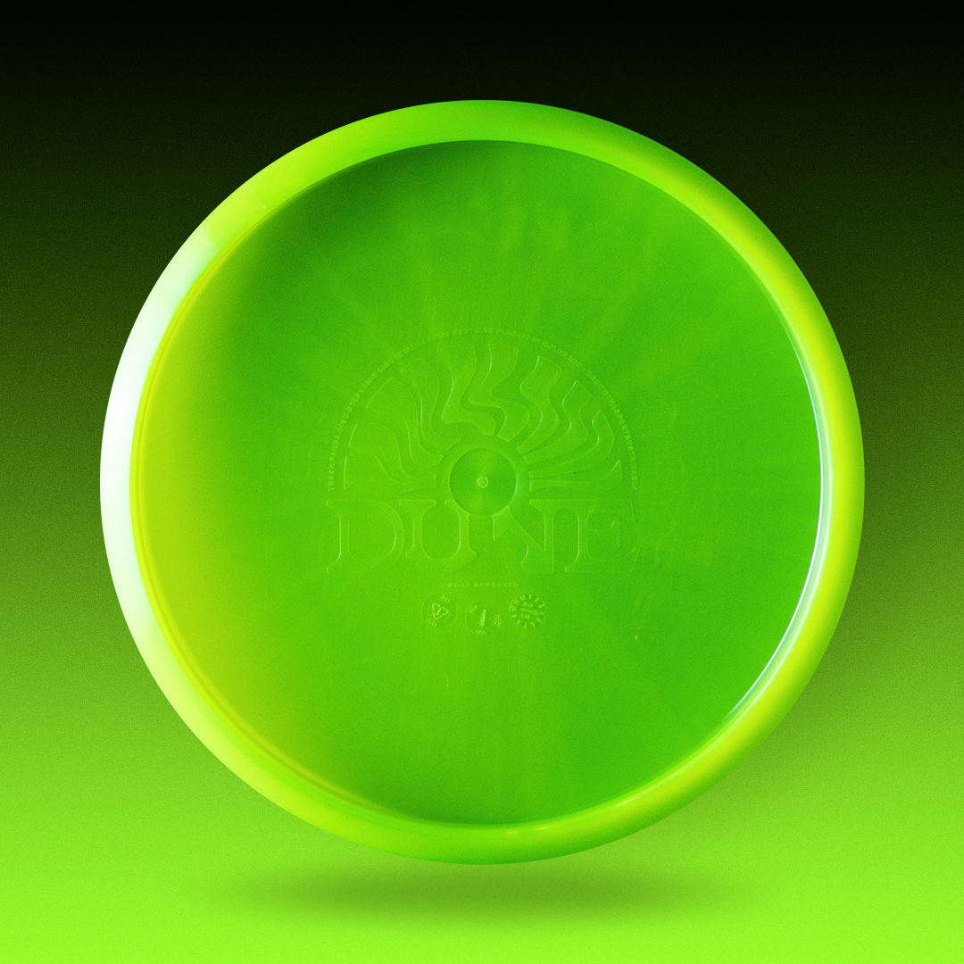 Photo of Maria Oliva's Dayglow Signature Series Dune disc golf disc midrange by Trash Panda