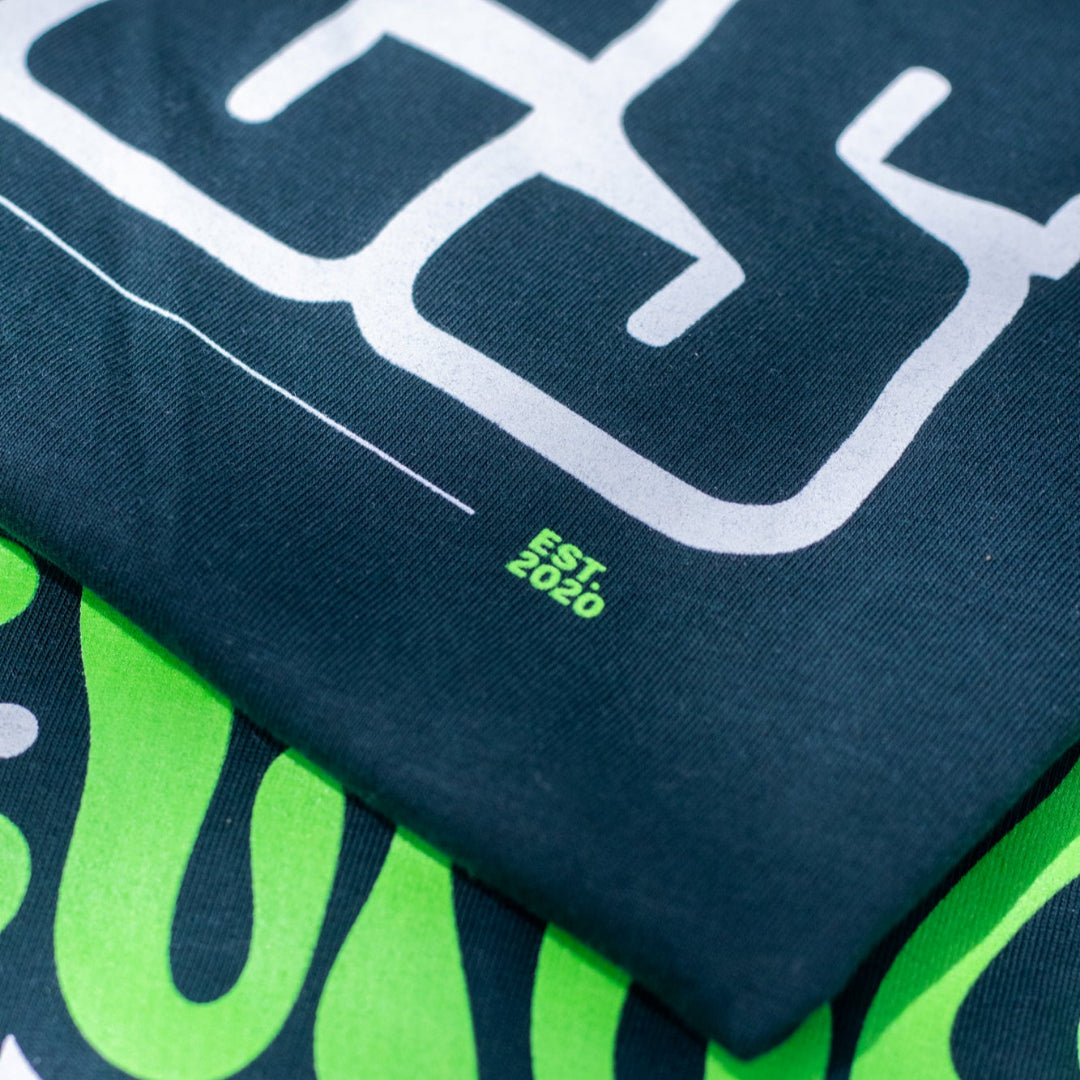 trash panda disc golf sustainable tee est 2020 closeup